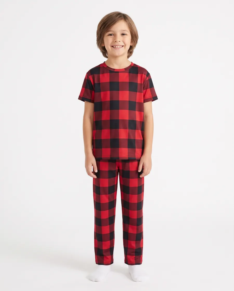 The kids' pajamas in buffalo plaid, worn