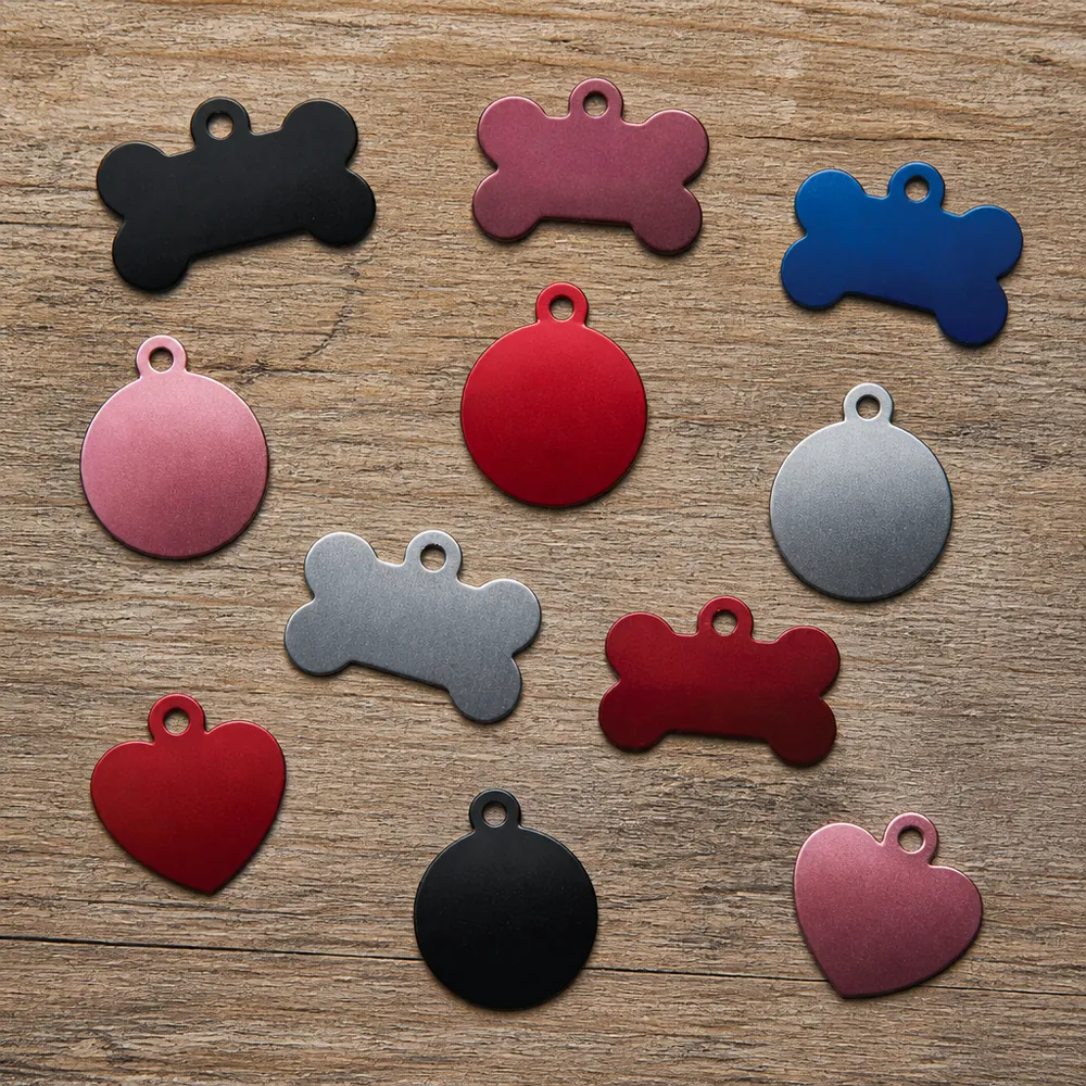 Engraved tags in every shape and color: bone, circle and heart