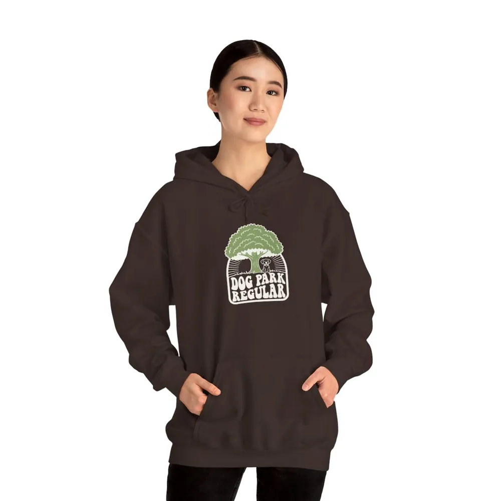 Model wearing the Dog park regular hoodie in Espresso
