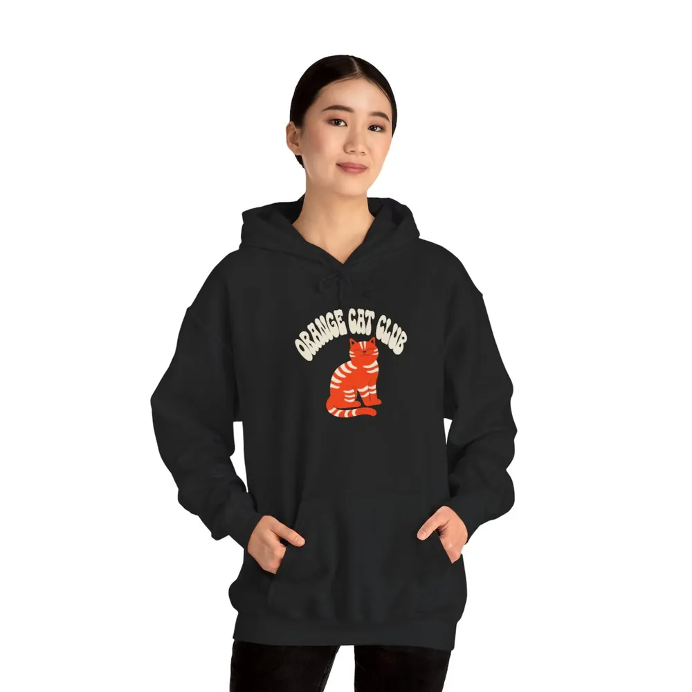 Model wearing the Orange cat club hoodie in Black