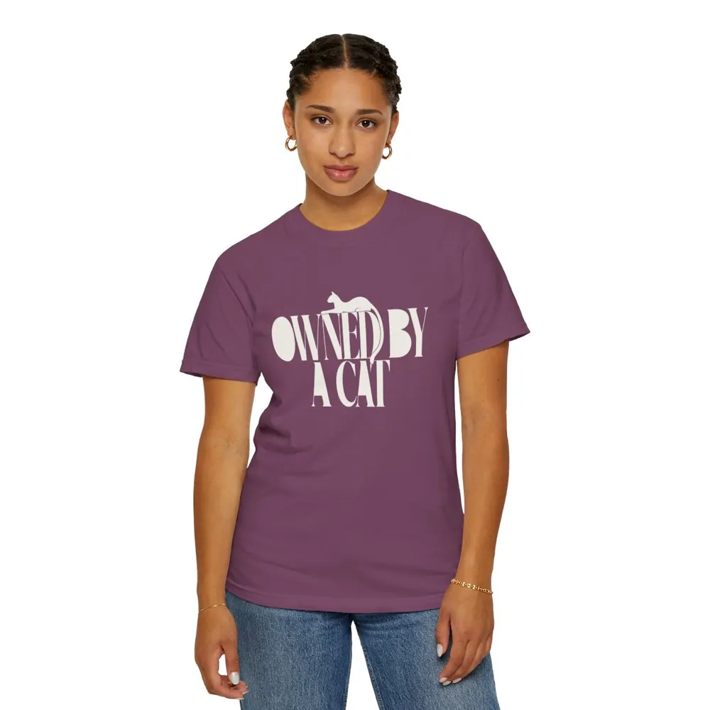 Model wearing the Owned by a cat tee in Burgundy